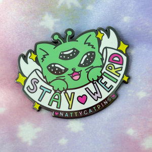 
            
                Load image into Gallery viewer, Anime NYC Exclusive “Stay Weird” Enamel Pin
            
        